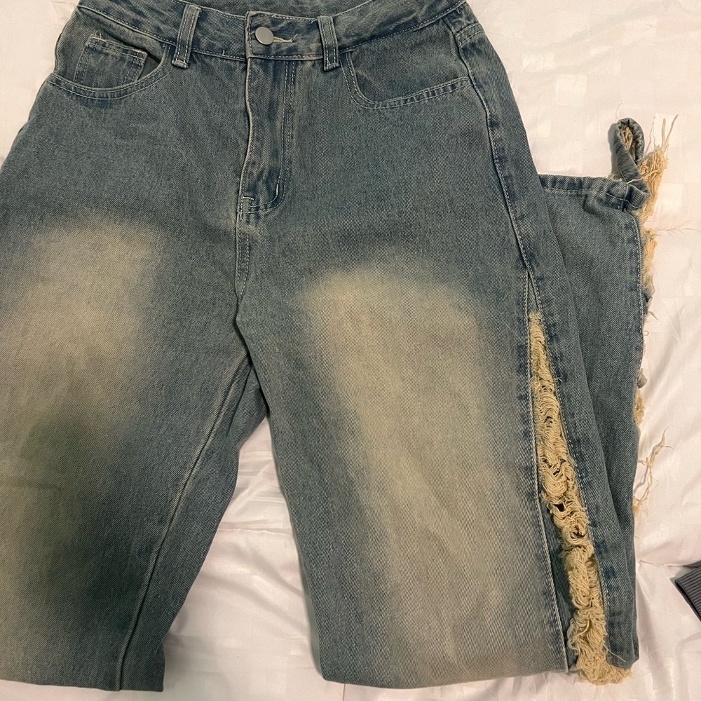 Distressed Blue Jeans
